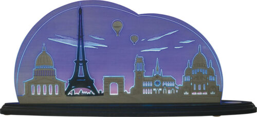 Tischleuchte aus bläulich scheinendem Acrylglas in Verbindung mit Sperrholz. Zu sehen ist die Stadt Paris.